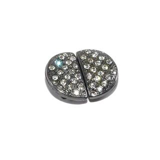 Broche metal con minicristales. Pavonado y plata