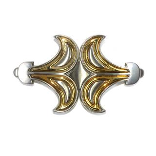 Broche metal arabesco oro y plata