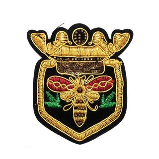 Escudo bordado dibujo abeja negro y oro